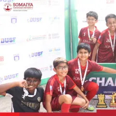 The joy of victory. Our U-9 champions proudly show off their medals after a successful tournament run.