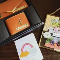 This couple's wallet combo and handmade frame makes for a perfect wedding or anniversary gift. The items are personalized and presented in a beautiful gift box.