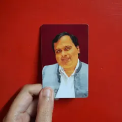 Here is the finished physical wallet card with a custom digital portrait. The cards are durable and have a high-quality finish.