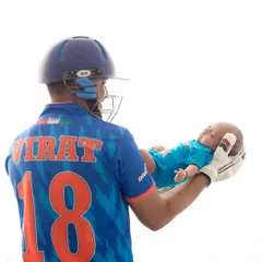 For the love of cricket! A father dressed in a Virat Kohli jersey holds his newborn, a perfect shot for a cricket-loving family welcoming their newest team member.