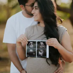 The first hello. Incorporating your baby's sonogram into the photoshoot is a beautiful way to make them part of the story from the very beginning. This is one of my favorite moments to capture during a pregnancy announcement shoot.