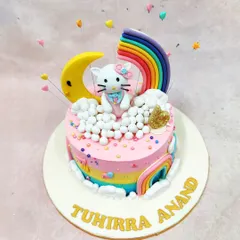 We bring dreams to life with this Hello Kitty Rainbow Cake. This design combines a beloved character with a vibrant, magical world of rainbows, moons, and clouds, demonstrating our skill in creating colorful, multi-element cakes that are a feast for the eyes.