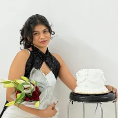 Another lovely shot from the same birthday photoshoot, featuring our classic white piped cake.