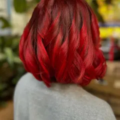 The dimension in this red is everything. We used different tones to create a multi-faceted, fiery look. (No filter)