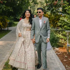 A perfect wedding reception look for our groom, Monish Mehta. We crafted this elegant sage green suit from a luxurious Super 130s merino wool blend, creating a sophisticated look that perfectly complemented the romantic, meadow-inspired setting.