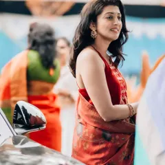 A candid portrait of actress Pranitha Subhash at an event. This shot captures her natural grace and radiant smile in a real-world setting.