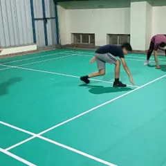 Agility and footwork are key in racket sports. Here, a student performs a speed drill on our synthetic badminton court to improve his on-court movement and reaction time.