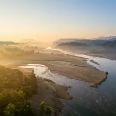 The early morning sun breaking through the mist over a river in the Western Ghats. This is the kind of atmospheric condition I'm always searching for.