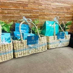 The Ivana by Jindals branded hampers lined up, showing the consistent and calming turquoise theme.