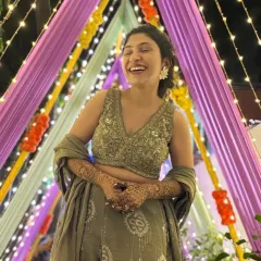 A happy bride laughing during her mehendi ceremony. These moments of joy are what I live for.