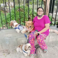 Ramya taking a short break during a walk with a few of the kiddos. We love spending quality time with them outdoors.