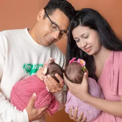 The look of pure adoration from parents meeting their newborn twins. These are the memories that last a lifetime.