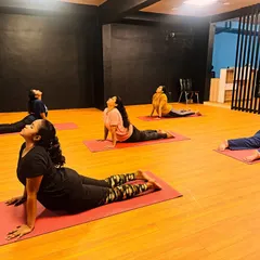 We also slow things down with power yoga. This is a shot from a cool-down session, focusing on poses like the upward-facing dog to improve flexibility and build core strength.