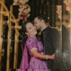 A spontaneous kiss and a joyful laugh. This is the essence of our candid photography, capturing the real, unscripted moments of happiness that make your Sangeet night unforgettable.