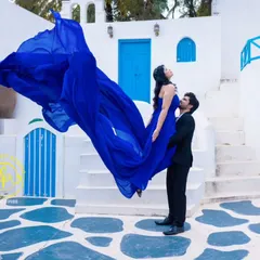 Create a magical moment with this royal blue flying gown, perfect for pre-wedding photoshoots. The lightweight trail catches the wind beautifully, making you feel like you're floating.
