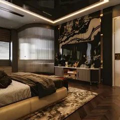 A dark and moody master bedroom with a dramatic black marble feature wall behind the TV. The room's luxury is enhanced by a reflective ceiling, curved glass partition, and rich textures.