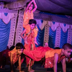 Look at the focus and teamwork from my amazing kids during their Ganesh Chaturthi performance. I choreograph routines that are not only fun but also include impressive moves like this human pyramid, helping them shine on stage.