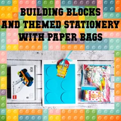 A complete building block and stationery set, shown with its matching blue paper bag and personalized thank you tag.
