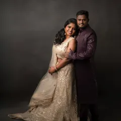 This couple looks absolutely stunning in their elegant Indian attire. The way they hold each other creates a portrait that is both regal and full of love.
