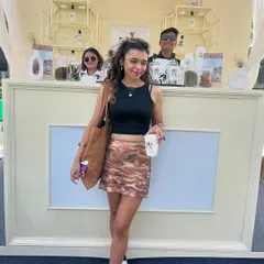 A guest poses at our Zoya Gin bar at India Cocktail Week. Our setups are designed to be elegant and photo-worthy, enhancing brand presence.