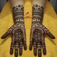 This unique design features a beautiful archway on the palms filled with delicate birds, creating a picturesque scene. The wrists are adorned with contrasting dark and light bands for a striking effect.