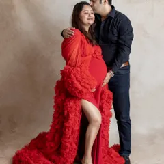 We believe maternity photos are about connection. This tender moment between an expecting couple, captured in our studio, showcases the love and anticipation that makes this time so special.
