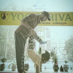 We guide our youngest yogis into poses like handstands with full support, building their confidence and body awareness.