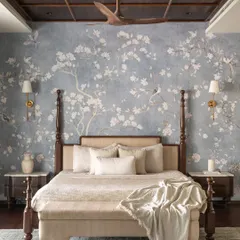 A bedroom should be a sanctuary. For this master suite, we created a dream-like atmosphere with a custom chinoiserie wallpaper, a classic four-poster bed, and a dark wood coffered ceiling, weaving a story of timeless romance and tranquility.
