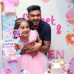 Pure joy at a Candyland-themed party. We create a world of sweets with donut and ice cream props, a custom cake, and a backdrop that looks good enough to eat.