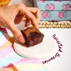 Our gooey, rich Assorted Brownies are here to make any day extra indulgent. This one features a luscious raspberry filling.
