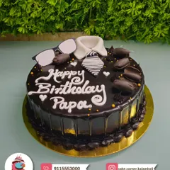 A rich chocolate truffle cake for Papa's birthday. The design is simple, with a fondant shirt collar and glasses, letting the delicious flavour be the hero.
