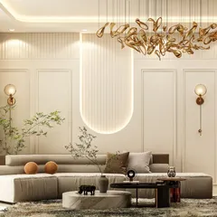 This living room design uses wall paneling and recessed lighting to create a subtle yet sophisticated feature wall. The neutral color palette, accented with warm wood tones and modern lighting, results in a calm and contemporary living space.