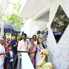 The unveiling of our studio sign during the grand opening ceremony. It was a proud day, surrounded by friends, family, and supporters.