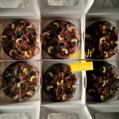 A batch of my round Christmas plum cakes ready for delivery. I offer both alcoholic and non-alcoholic versions to suit everyone's preference, without compromising on the authentic taste.