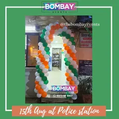 Another view of the Independence Day balloon gate at the Virar police station. The saffron, white, and green spiral pattern provides a full and festive look for any official or public building.