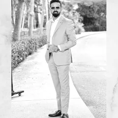 A classic black and white shot of my suit style. A sharp suit brings confidence and class to any event.