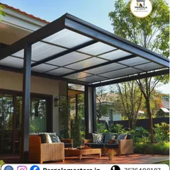 This attached glass pergola demonstrates how we can extend a home's living area. The translucent roof allows for soft, diffused light, creating a bright and comfortable outdoor seating area that is shielded from direct sun and rain.