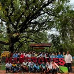 Students at the "Save Mangroves" park, an important stop on our educational coastal tour. I believe in promoting environmental awareness through travel.