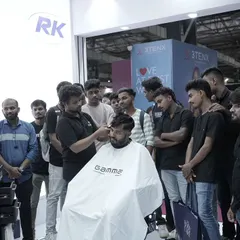 Another view from the barber expo, surrounded by aspiring stylists. It's a great environment for learning and inspiration.