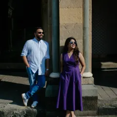 A relaxed, stylish portrait using the strong lines and shadows of a classic Mumbai building. This kind of shot is perfect for a modern, chic couple shoot.