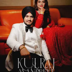 A stylish and modern reception portrait of Kulraj and Manpreet. His white tuxedo and her red gown create a striking look, perfect for a high-fashion wedding aesthetic.