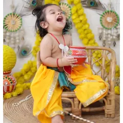 The pure joy of our Janmashtami theme shoot. We love capturing these energetic and happy moments as your little one celebrates, dressed as the playful Lord Krishna.