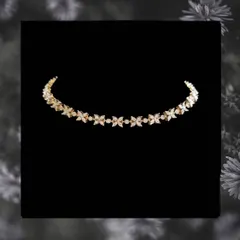 A delicate and budget-friendly diamond necklace with a floral-inspired design. This piece offers the look of real diamonds in a light, wearable, and affordable style.