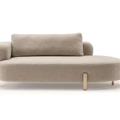 The Roman couch, conceived for timeless and sophisticated interiors. This piece offers a generous seat, independent cushions, and a plush, rounded armrest, all resting on elegant metal legs.