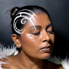 A different angle of the hair liner, showing how it frames the face and creates an unexpected focal point.