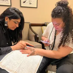 It was a pleasure to do a quick mehendi for a talented makeup artist from France. This photo captures the moment of creation and cultural exchange, as she documents the process.