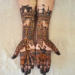 For the bride with a globetrotting romance. This design brings together the skylines of Mumbai and Paris, telling a story of love that connects continents. Whether it's a landmark from your hometown or the city where you got engaged, I can weave it into your bridal mehendi.