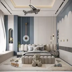 This imaginative boy's room features a cool airplane-themed light, a cloud-shaped wardrobe, and a color palette of calming blues and greys.