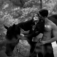 Another artistic shot from a photoshoot, showcasing the intimate and dramatic scenes that can be created with our horses in the wooded areas of our property.