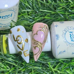 An elegant Valentine's set featuring "LOVE" in gold chrome and a hand-painted heart design. A sophisticated way to show some love.